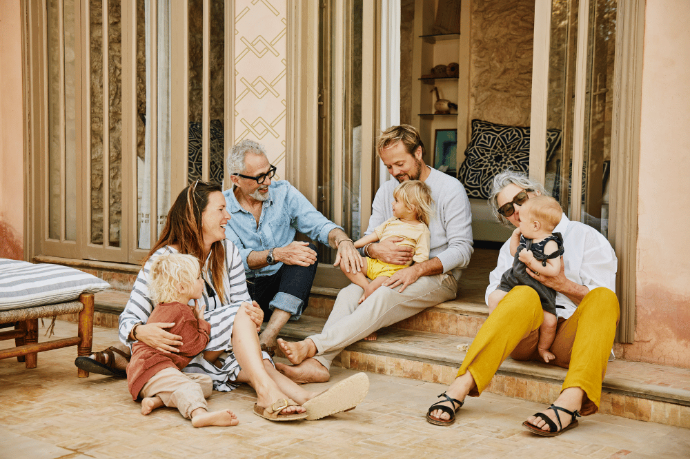 A family hanging out on the step