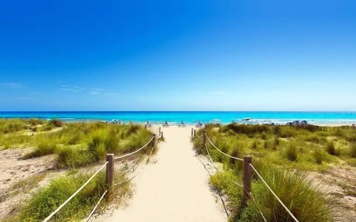Visiting Son Bou, Menorca as a Family